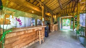 a kitchen with a counter in a house at Villa Alisha Pererenan Canggu in Canggu