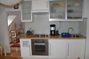 Kuchnia lub aneks kuchenny w obiekcie City Apartment Vasiri