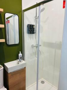 a bathroom with a shower and a sink at Your Harrogate Stay in Harrogate +27 photos