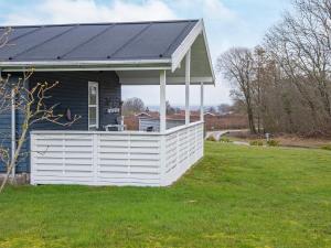 a house with a solar roof on a yard at 6 person holiday home in Sydals in Sarup +25 photos