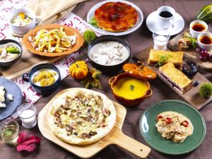 a table with various food items on it at Sapporo View Hotel Odori Park in Sapporo