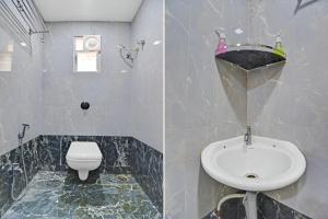 にあるStay Retreats At Hotel Destiny Nagpur - Near Airportの洗面台とトイレ付きのバスルーム
