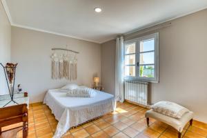 Ένα ή περισσότερα κρεβάτια σε δωμάτιο στο L'évaroma +32 φωτογραφίες