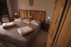 Ένα ή περισσότερα κρεβάτια σε δωμάτιο στο La Mariachiara