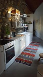 A kitchen or kitchenette at Seafront Villa Aggeliki