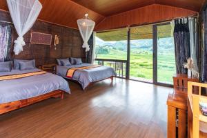Giường trong phòng chung tại Sapa May Homestay