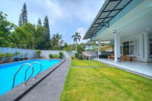 Bazén v ubytování Villa Ixora Resort nebo v jeho okolí