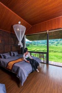 Giường trong phòng chung tại Sapa May Homestay