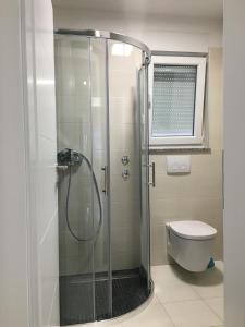 Koupelna v ubytování Apartmani Zaton + 25 fotografií