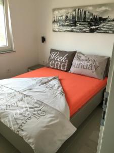 Postel nebo postele na pokoji v ubytování Apartmani Zaton