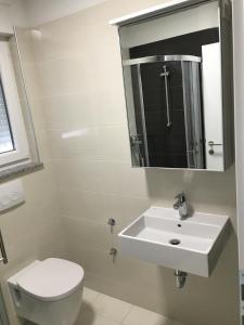Koupelna v ubytování Apartmani Zaton
