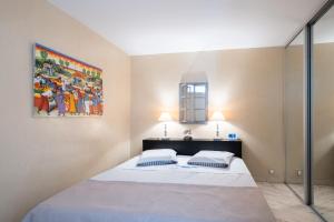 Postel nebo postele na pokoji v ubytování Les Trois Rivières Côté Parc