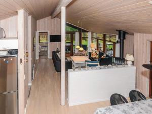 a kitchen and living room in a house at 6 person holiday home in Læsø-By Traum in Læsø +38 photos