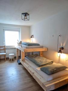 Postel nebo postele na pokoji v ubytování Ferienhaus Oelsener Höhe