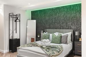 Ένα ή περισσότερα κρεβάτια σε δωμάτιο στο Luxury Studio Stratford London