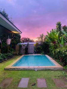 a swimming pool in the backyard of a house at Lanta sky pool villa in Ko Lanta