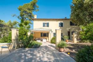 an exterior view of a house with trees at Cote D'azur Villa avec pisicine in Saint-Paul-de-Vence