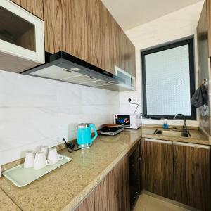 Dapur atau dapur kecil di Seaview cozy Apartment Forest City