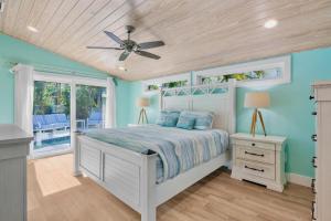 En eller flere senge i et værelse på Bean Point Bungalow + 34 billeder