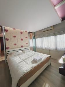 Ένα ή περισσότερα κρεβάτια σε δωμάτιο στο Skyline Apt 5 mins to Lee Garden +8 φωτογραφίες