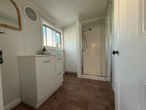 Ένα μπάνιο στο Longford Cottage +9 φωτογραφίες