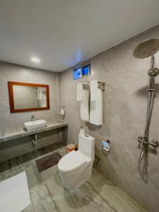 Un baño de Thila Hotels