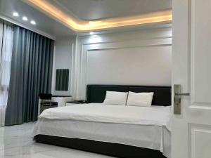 Postel nebo postele na pokoji v ubytování Ecorivers Hải Dương