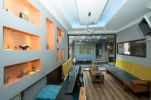 a living room with a couch and a table at Deluxe Valeria in Istanbul