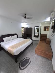 Voodi või voodid majutusasutuse Raj Resort Calangute toas