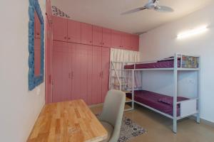 Postel nebo postele na pokoji v ubytování Chennai Pods Womens Hostel + 4 fotografie