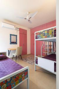 Postel nebo postele na pokoji v ubytování Chennai Pods Womens Hostel