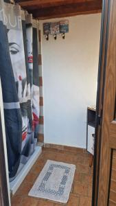 a door leading into a room with a closet at a due passi dal mare in Campofelice di Roccella