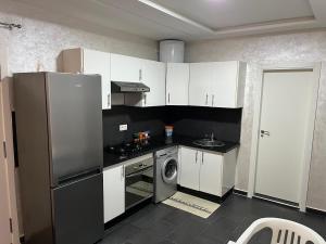 Kuchyň nebo kuchyňský kout v ubytování Appartement standing Martil