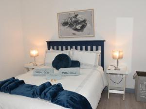 Katil atau katil-katil dalam bilik di Seaview Holiday Villa