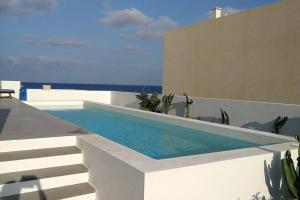 Πισίνα στο ή κοντά στο Casa Galana, disfruta junto al mar