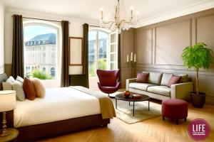 a bedroom with a large bed and a living room at LIFE RENAISSANCE - New Concept - Place Kléber in Strasbourg
