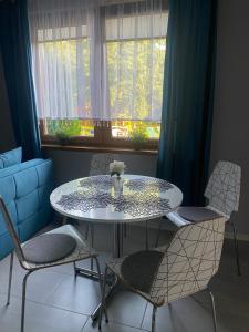Χώρος καθιστικού στο Pokoje i apartamenty Sobótka
