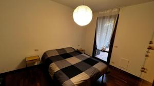 Ένα ή περισσότερα κρεβάτια σε δωμάτιο στο La Casa Euganea