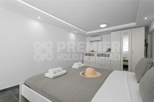 Ένα ή περισσότερα κρεβάτια σε δωμάτιο στο Apartment Susanna +7 φωτογραφίες