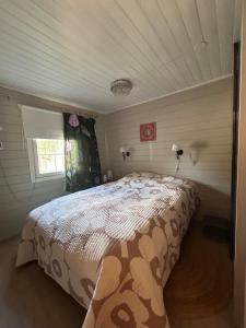 a bedroom with a large bed in a room at The atmosphere of home in Levi in Levi