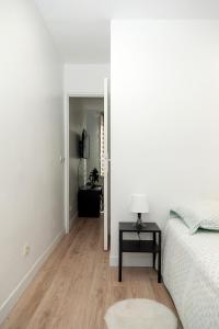 Ένα ή περισσότερα κρεβάτια σε δωμάτιο στο Cosy deux pièces