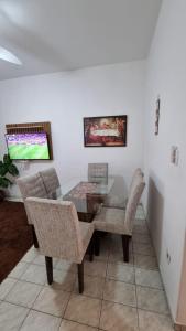Posezení v ubytování Apartamento confortável a 5min da Basílica