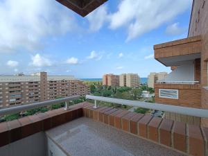 a balcony with a view of the city at ACV - Torremar-2ª linea planta 8 norte in El Borseral