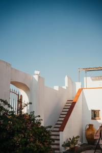 a set of stairs leading up to a building at Luxery Resort Triglie in Crispiano