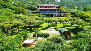 an aerial view of a house with a garden at Hotel Querceto Wellness & Spa - Garda Lake Collection in Malcesine +78 photos