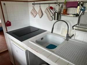 Kuchyň nebo kuchyňský kout v ubytování Villetta Gabriella