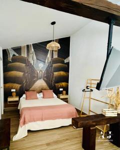 a bedroom with a bed and a wall with a staircase at Loft Alegría de Jerez in Jerez de la Frontera