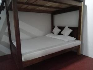 Postel nebo postele na pokoji v ubytování Blossom