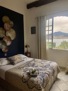 En eller flere senge i et værelse på VILLA, Domaine de l'Ogliastru