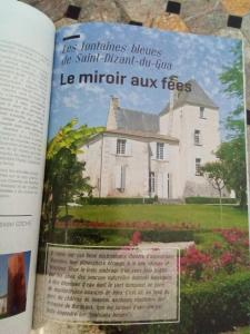 an open book with a picture of a house at Chambre d'hôtes au milieu des vignes in Saint-Dizant-du-Gua